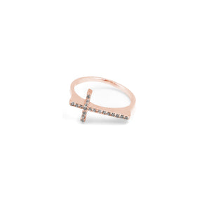 A modern fine jewelry cross diamond ring crafted in rose gold, combining a sophisticated design with radiant diamonds for a stylish appeal.