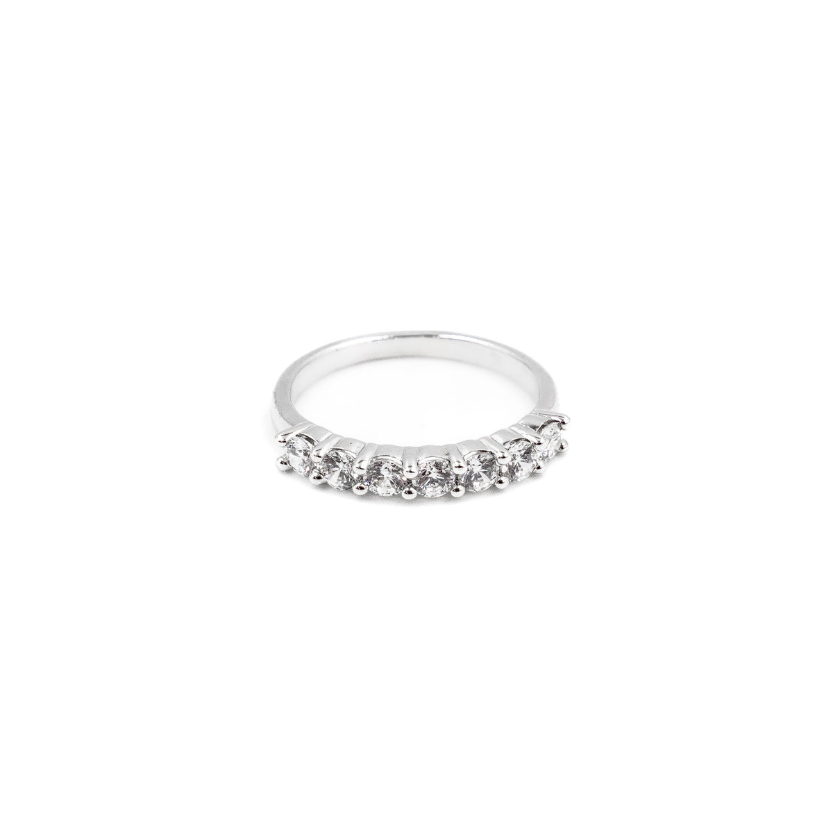 A fine jewelry dainty stacking ring in 925 sterling silver, featuring seven brilliant diamonds arranged delicately for a sleek and modern look.