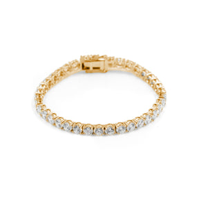 Luxurious diamond tennis bracelet in gold metal, crafted as fine jewelry for hip-hop jewelry trends. Premium design by Caretino, ideal for modern accessories in the UK, Ireland, Germany, and Canada.