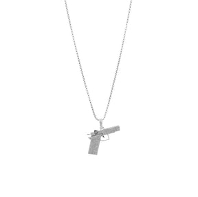 "Detailed zoom of the Gun Pendant in 925 silver with chain, showcasing the craftsmanship and dazzling diamond accents.