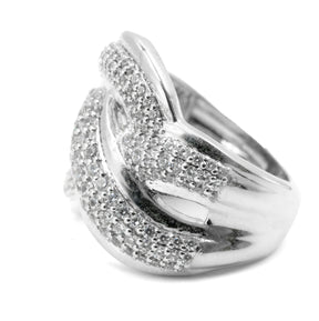 Left side view of a 925 silver ring, showcasing its smooth finish and diamond-encrusted design, a luxurious fine jewelry piece.