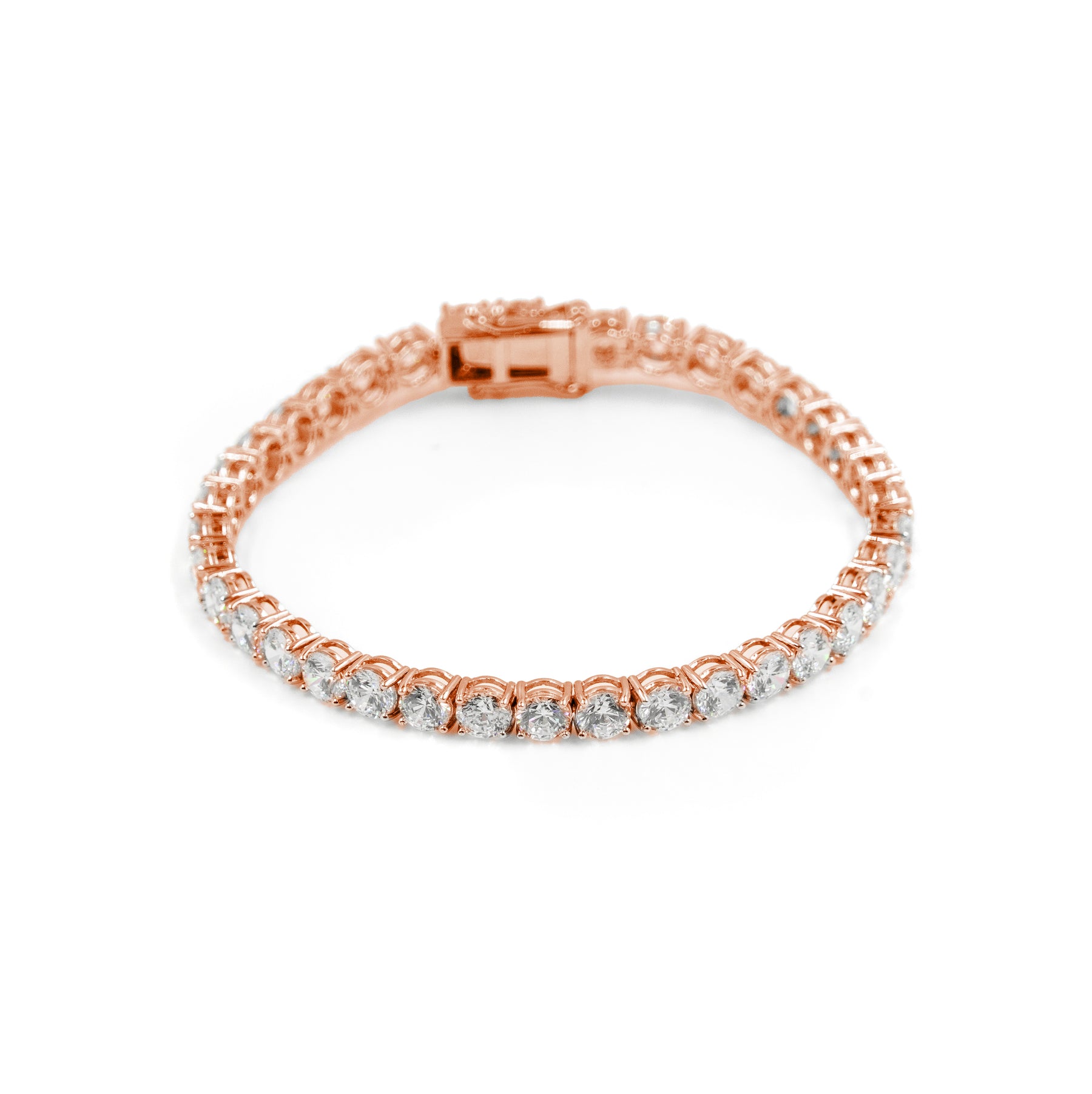 Stylish diamond tennis bracelet in rose gold metal, a fine jewelry statement piece for hip-hop jewelry fans. Designed by Caretino for fashionable individuals in the UK, Ireland, Germany, and Canada.