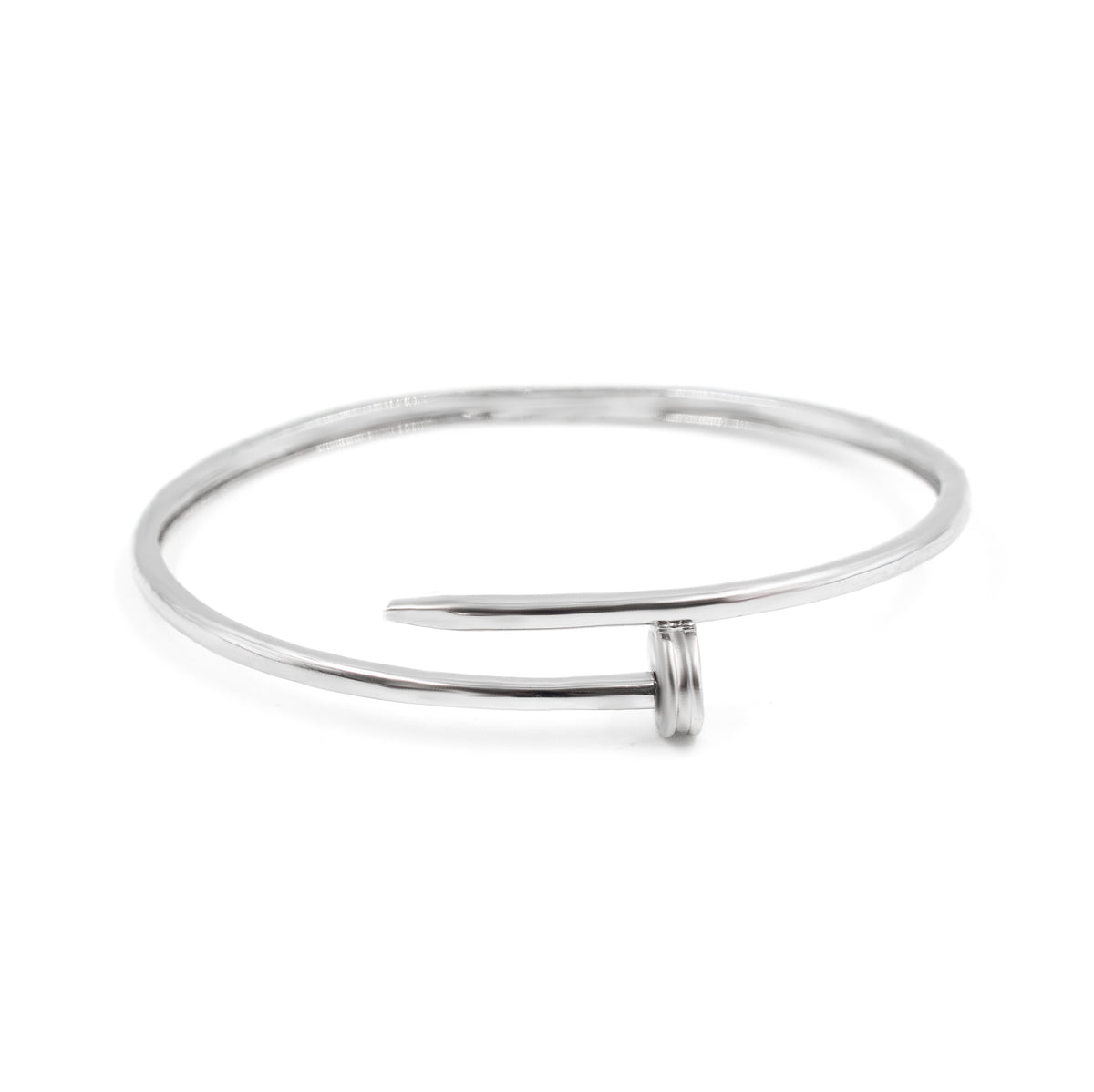 Sleek silver minimalist cuff bracelet, designed as fine jewelry with a modern and elegant look. A perfect accessory from Carat.Luxury.